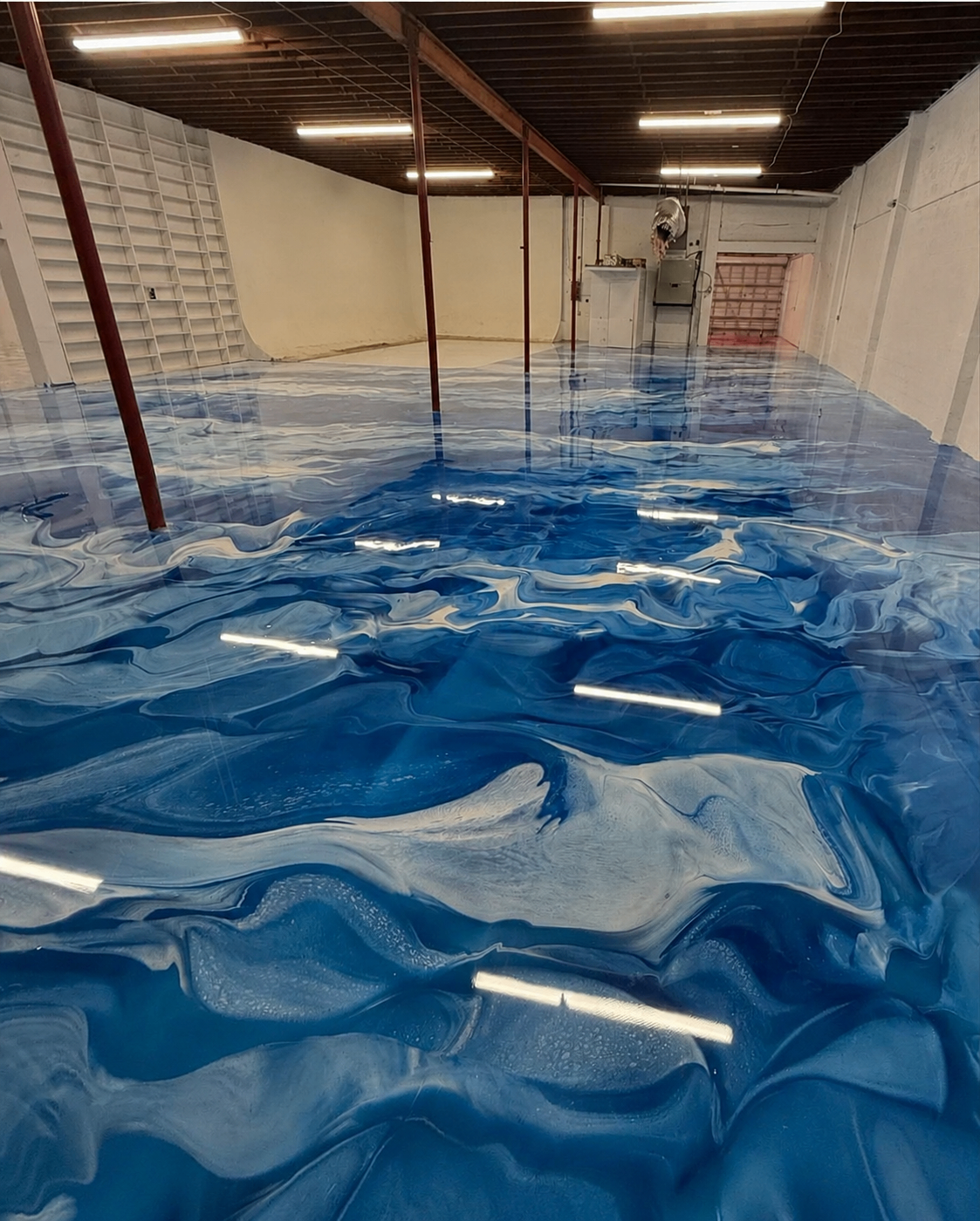 Metallic epoxy floor by ADZ EPOXY