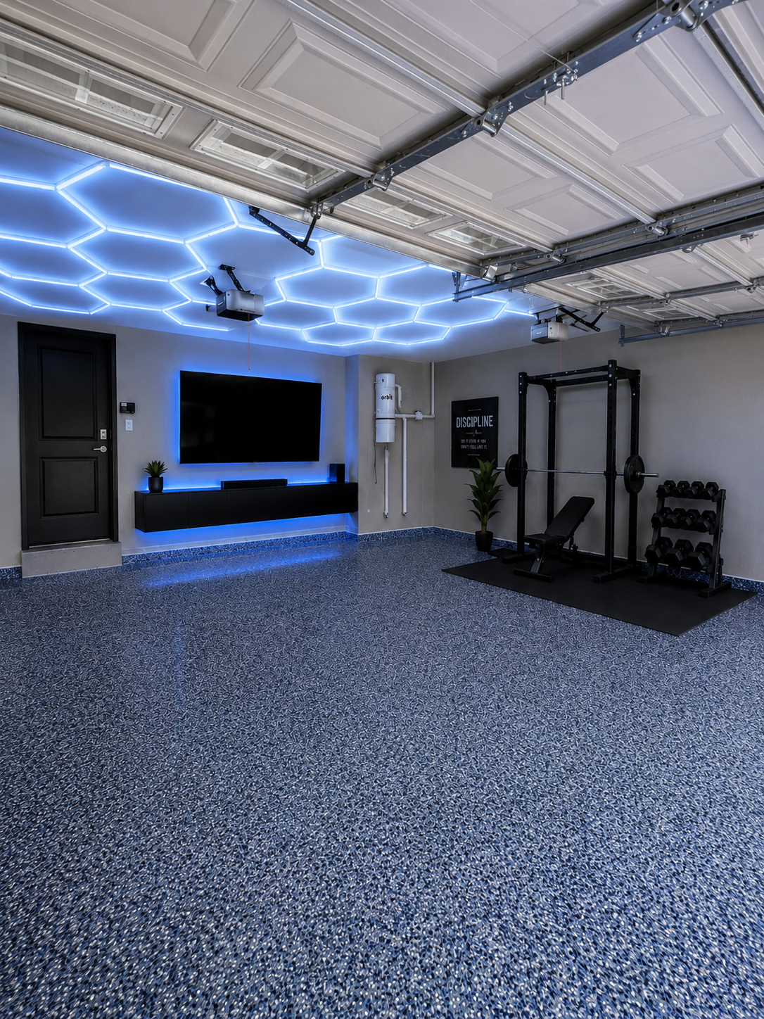 Blue flake garage gym with hexagon LED lighting